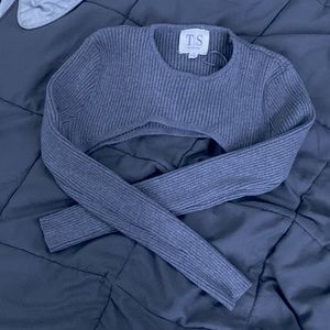 A petite crop top made to go with a shirt or sports bra, and barely worn.